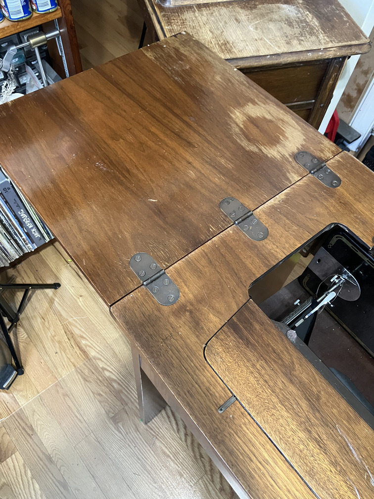Cabinet top with hinged leaf
